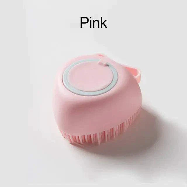 Pink soft silicone dog brush with gentle bristles and built-in shampoo dispenser for pet grooming