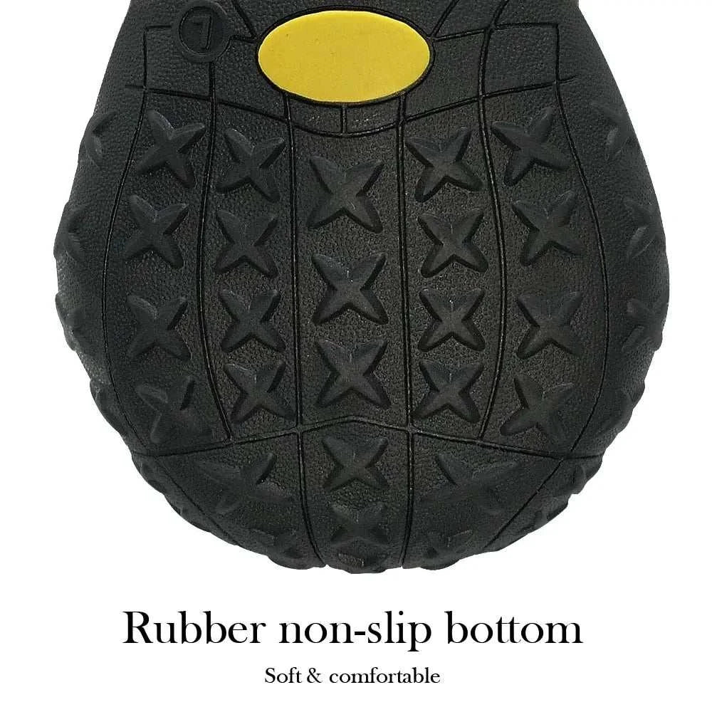 Close-up of rubber non-slip bottom of waterproof reflective dog boots showing traction pattern