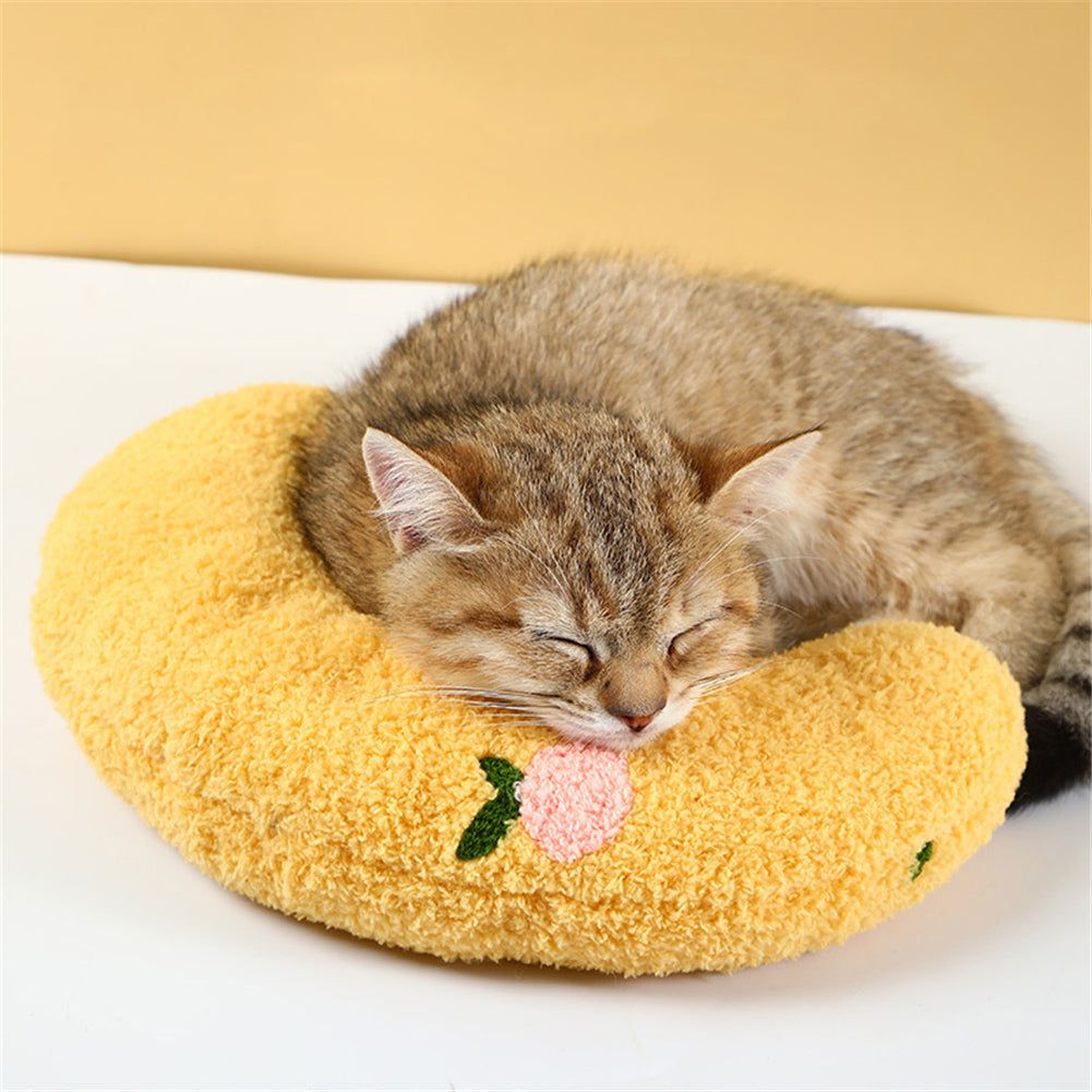 Kitten sleeping on yellow CatCozy Pillow For Cat with floral embroidery