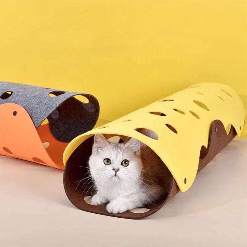 Cat tunnel toy with vibrant colors and multiple entrances featuring a white cat inside inviting playful exploration