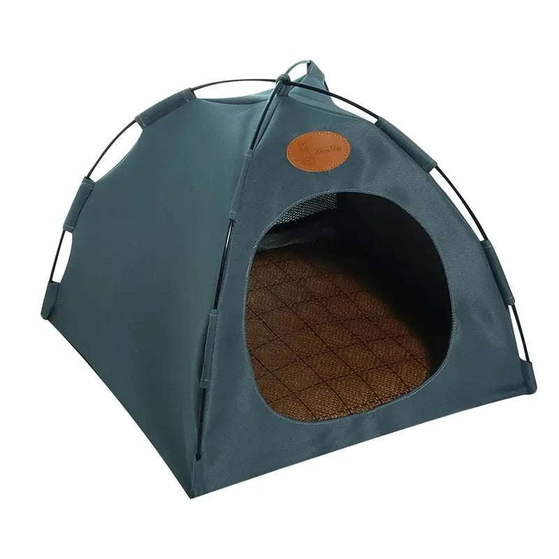 Foldable pet tent with water-resistant fabric and mesh windows for ventilation, portable and cozy retreat for pets.