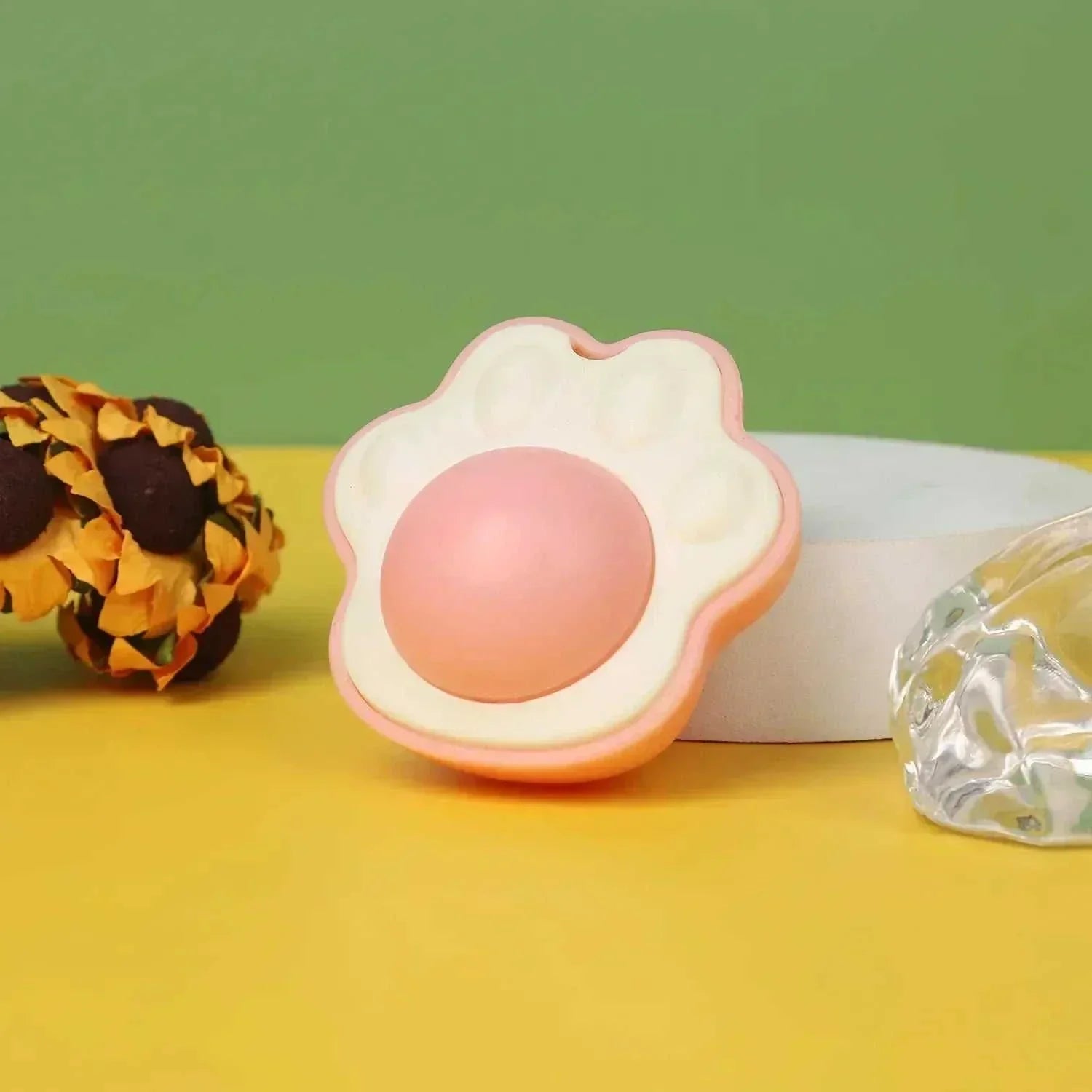 Natural Catnip Rotating interactive cat toy shaped like a paw for feline entertainment