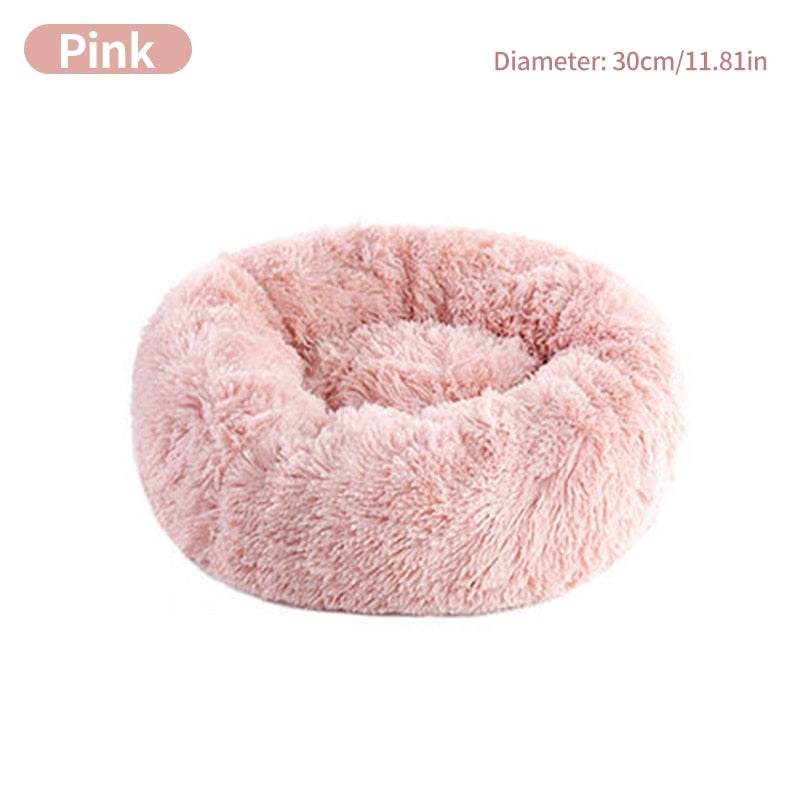 Pink calming pet bed donut shape soft plush round 12 inch diameter for small dogs and toy breeds
