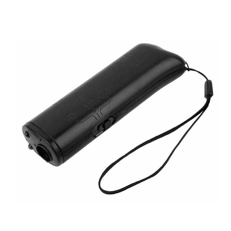 Compact black ultrasonic dog training device with wrist strap for humane behavior correction