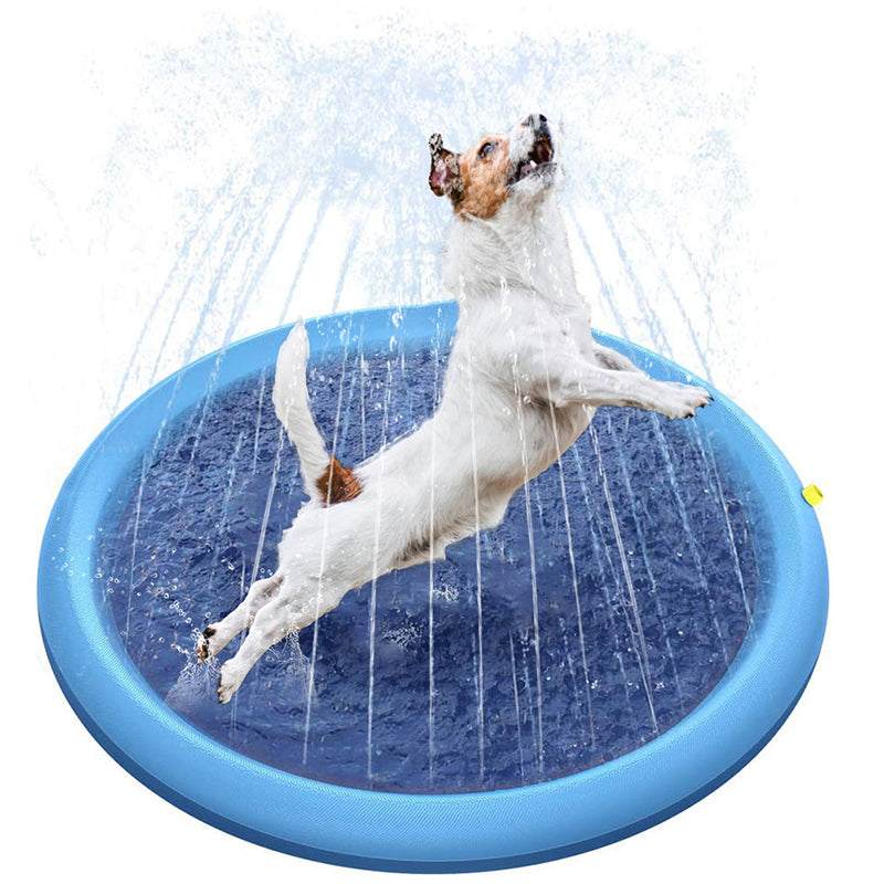 Dog jumping on blue Dog Splash Sprinkler Pad with water spraying for summer fun