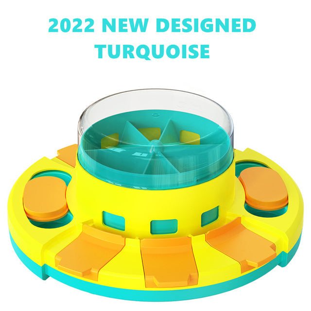 turquoise and yellow interactive puzzle toy for dogs with food compartments and non-slip base