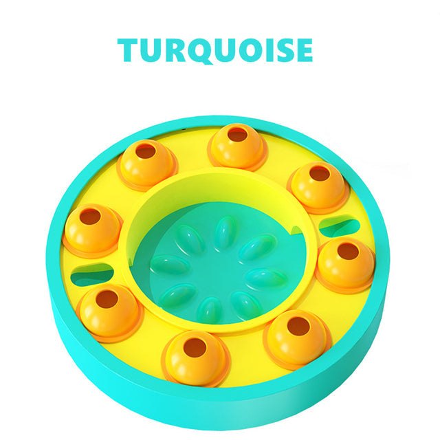 Turquoise interactive puzzle toy for dogs with food reward compartments and non-slip base
