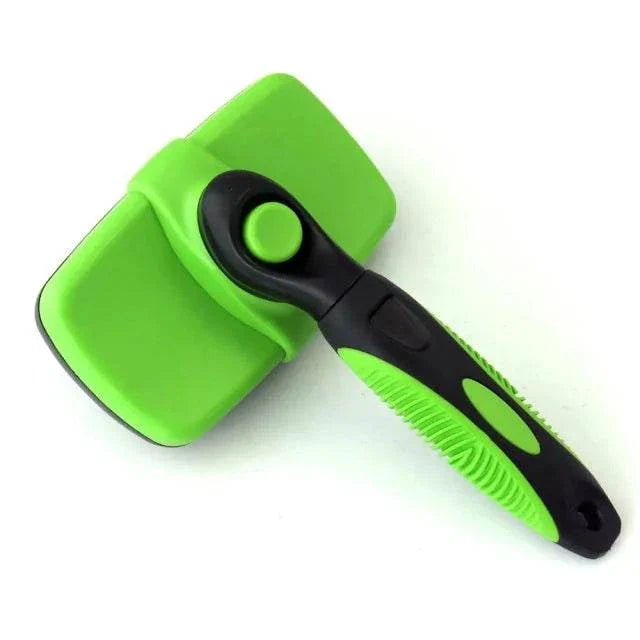 Green and black self cleaning dog brush with retractable bristles and anti-slip handle for grooming pets