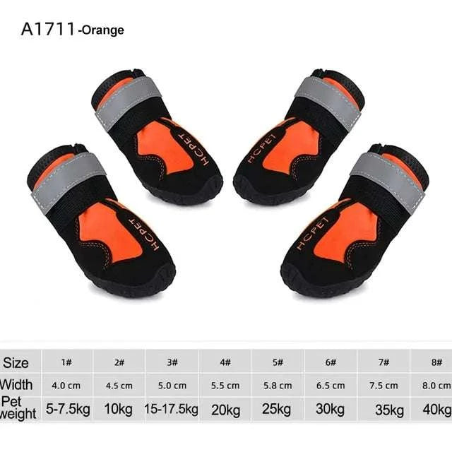 Waterproof reflective dog boots in orange with adjustable straps for paw protection and visibility