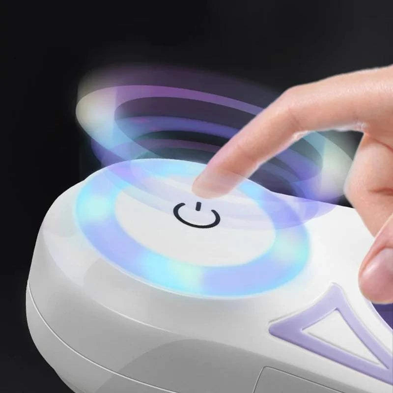 Close-up of hand pressing power button on white LED lights dog leash controller