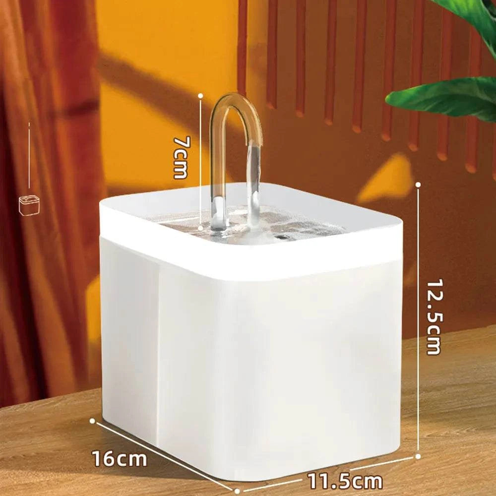 Compact white cat automatic water dispenser with filtered flowing water and three flow modes.