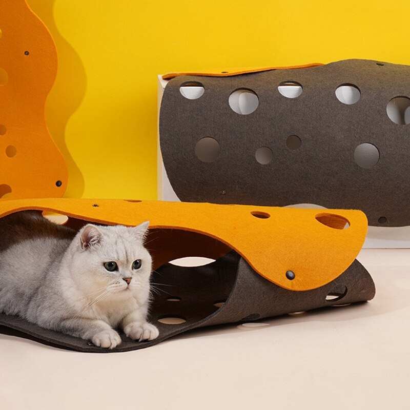Cat playing inside a durable, colorful cat tunnel toy with multiple holes and soft interior lining