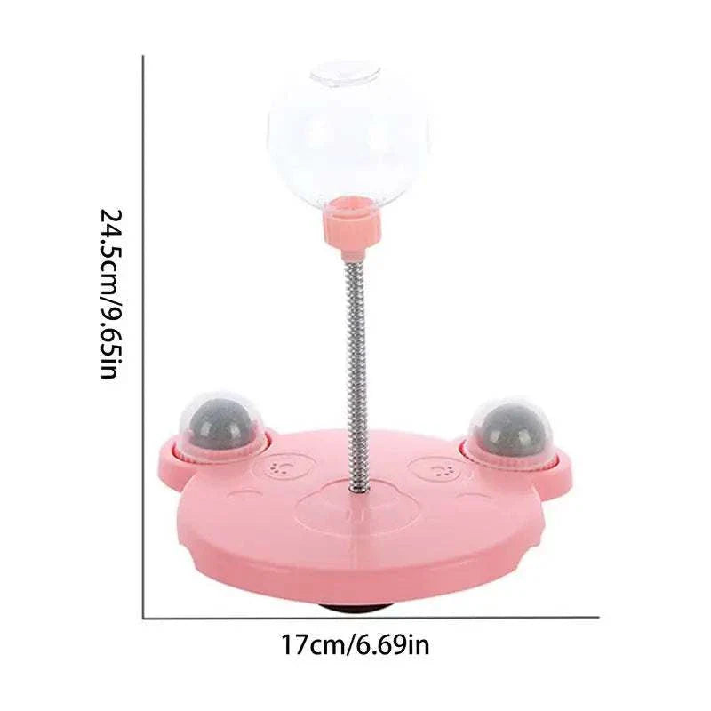 Leaking Treats Ball pet feeder toy with pink base, treat dispenser, and interactive play features for pets
