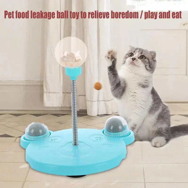 Leaking Treats Ball pet feeder toy with cat playing and treat dispensing feature