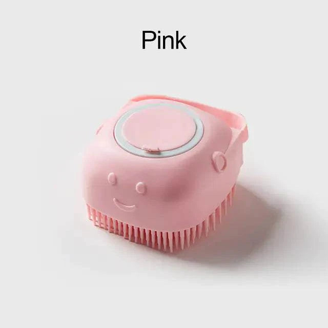 Soft pink silicone dog brush with gentle bristles and built-in shampoo dispenser for pet grooming
