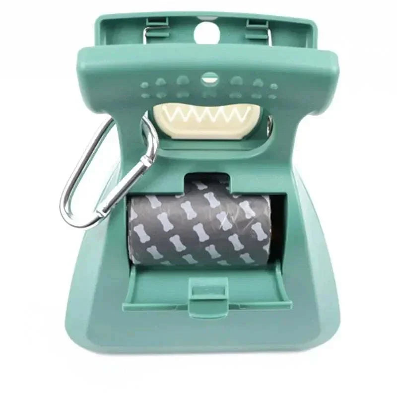 Portable folding dog poop scooper with waste bag dispenser and clip, green compact design for easy outdoor cleanup